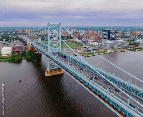 Benjamin Franklin Bridge crossing the delaware River towards Camden, New Jersey, United States. photo