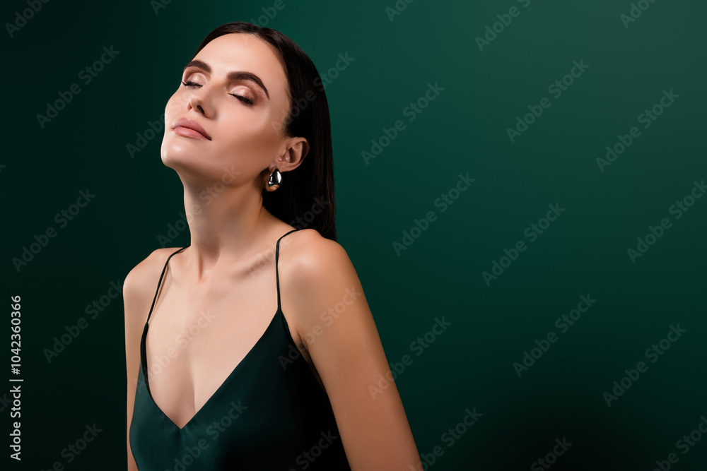 Photo of stunning lady dressed sexy outfit enjoying her beauty empty space isolated green color background Photo of stunning lady dressed sexy outfit enjoying her beauty empty space isolated green color background