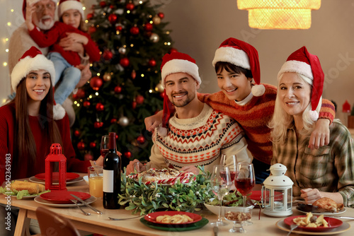 Big family having Christmas dinner at home in evening