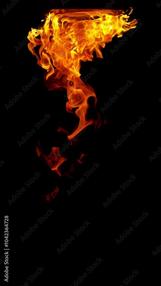 Super slow motion of fire flames isolated on black background. Filmed on high speed cinema camera at 1000 fps , vertical Super slow motion of fire flames isolated on black background. Filmed on high speed cinema camera at 1000 fps , vertical