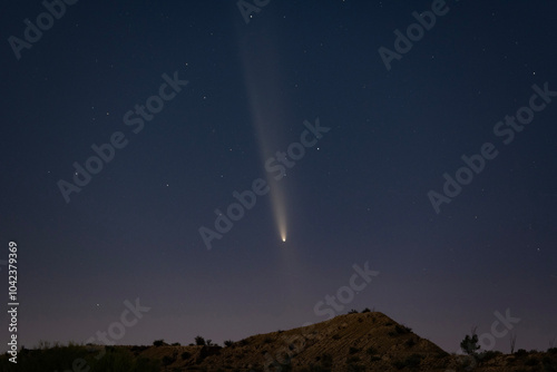 A bright comet in the evening sky