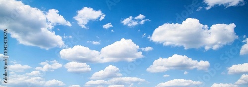 Panoramic view of blue sky with white clouds, high-resolution wide-angle shot with sharp focus and natural light.