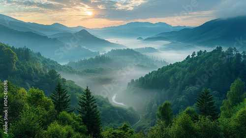 A misty mountain valley at dawn, with rolling hills covered in dense green forest and a river
