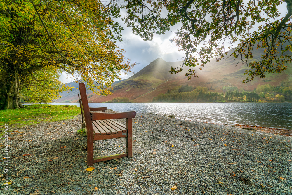 Bench at Buttermere, Lake District in autumn season. England. UK