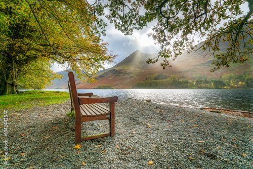 Obraz na płótnie Bench at Buttermere, Lake District in autumn season. England. UK w salonie