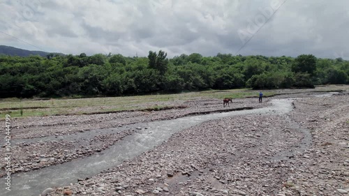 Stunning aerial drone footage of dried out river near a small village Ukur located in the Khizi District, near the Russian border, Azerbaijan, the Greater Caucasus mountain range, Central Asia, Asia photo