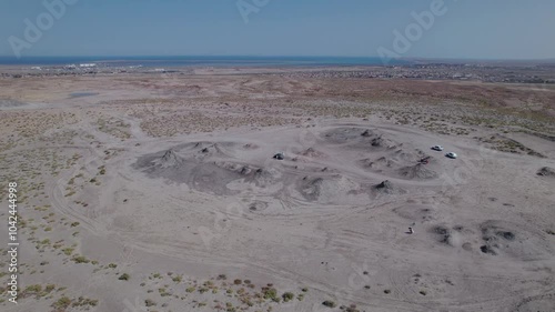 Stunning aerial drone footage of geological formations near Gobustan, part of one of the world's largest concentrations of mud volcanoes, Azerbaijan, Central Asia, Asia