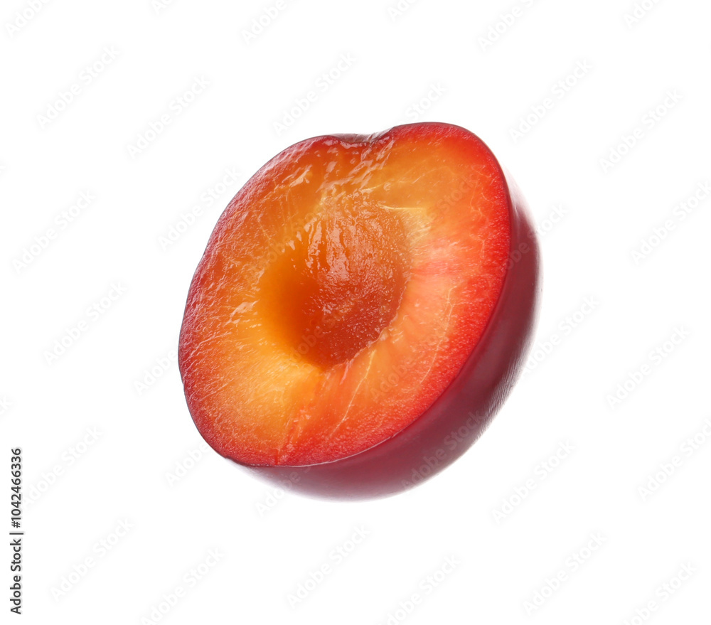 Half of ripe plum isolated on white Half of ripe plum isolated on white