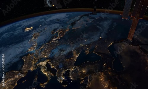 landscape photo of the earth at night with city lights on. photo from satellite