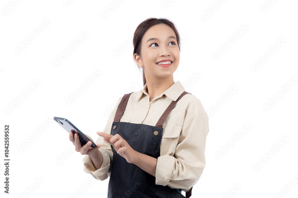Portrait happy young asian barista woman in apron smiling while looking smart phone isolated white background, waitress or entrepreneur watching smartphone, small business or startup, waiter of cafe. Portrait happy young asian barista woman in apron smiling while looking smart phone isolated white background, waitress or entrepreneur watching smartphone, small business or startup, waiter of cafe.