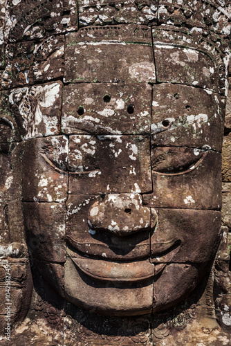 Ancient stone face of Bayon temple, Angkor, Cambodia