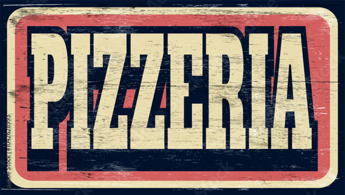Aged and worn pizzeria sign on wood