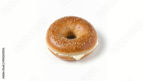 Freshly baked sesame seed bagel with cream cheese filling