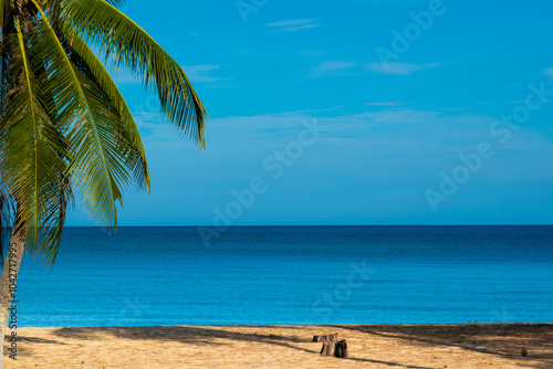 Nature of the beach and sea Summer with sunshine, sandy beaches, clear blue waters sparkling against the blue sky. On an island with good ecology and environment Background for summer vacation concept photo