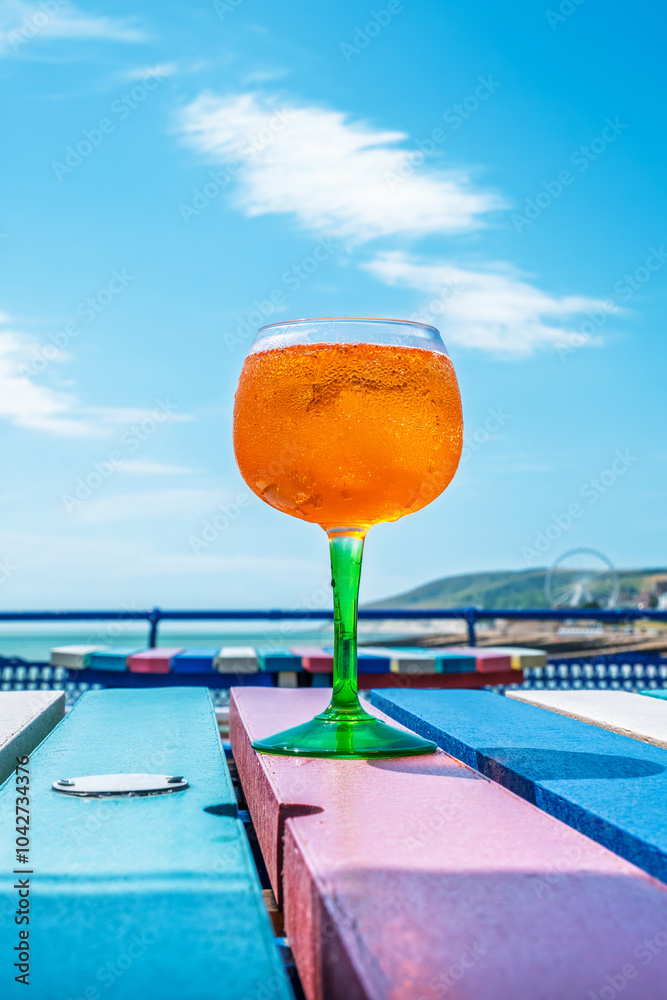 Glass of Aperol Spritz on the table. England