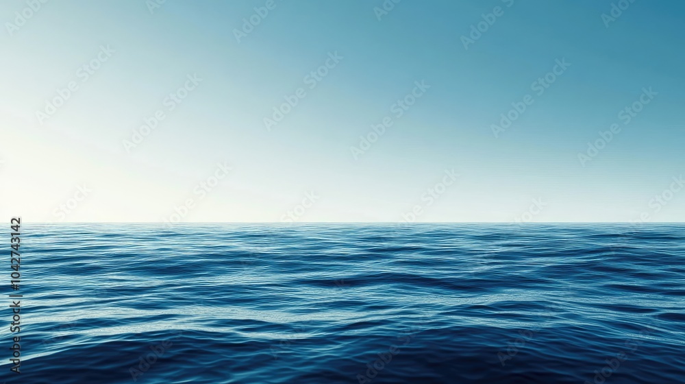 Fototapeta premium Calm Ocean Waters Under a Clear Blue Sky