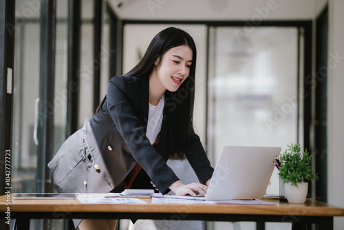 Freelance Asian businessman working independently using tablet computer in modern office. Accounting analysis report, real estate investment information, financial and tax concept. Free Download Freelance Asian businessman working independently using tablet computer in modern office. Accounting analysis report, real estate investment information, financial and tax concept. - GFXLoad