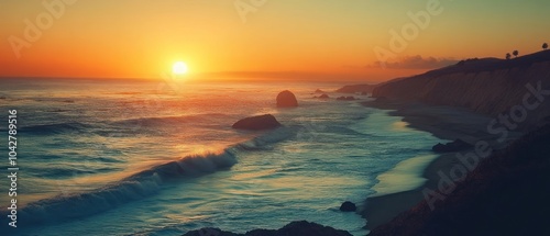 A serene sunset over a coastal landscape with gentle waves and cliffs.