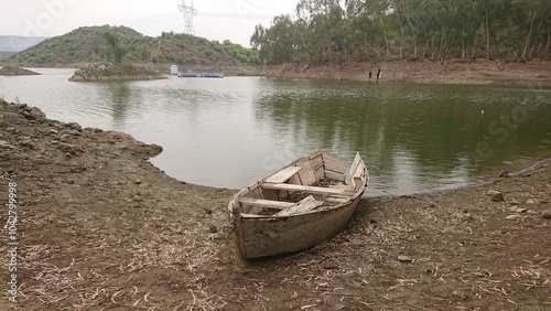 old boat on the lake photo