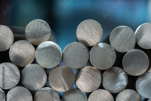 Stack of steel rods in a factory, a product of the metallurgical industry