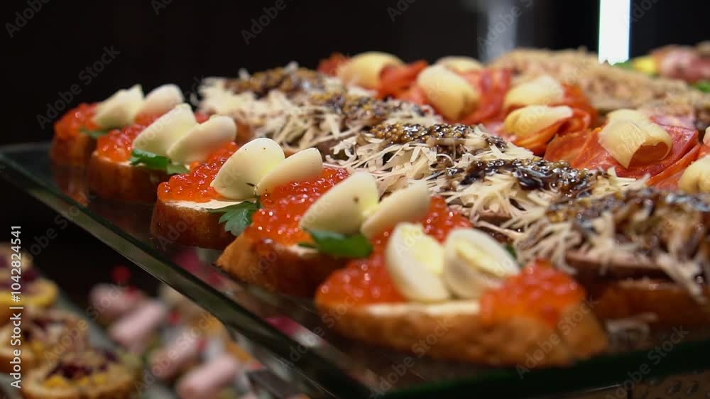 Beautifully decorated banquet table with appetizers from different ...