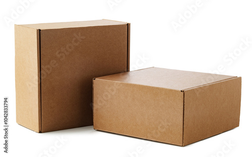 Two brown cardboard boxes stacked together on a plain surface photo