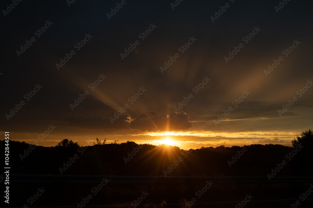 Dramatic sunset with dark sky and dark foreground Dramatic sunset with dark sky and dark foreground