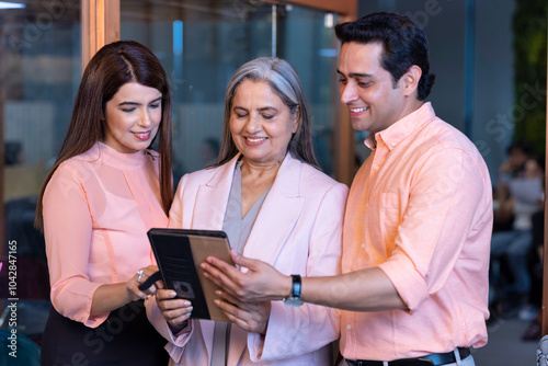 Business people working on digital tablet in the office