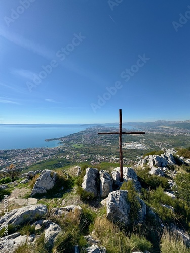 cross on the hill with a view of splitt kroatia
