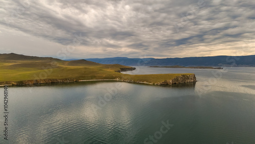 drone flight over the shore of Lake Baikal at sunset