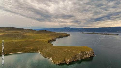 drone flight over the shore of Lake Baikal at sunset