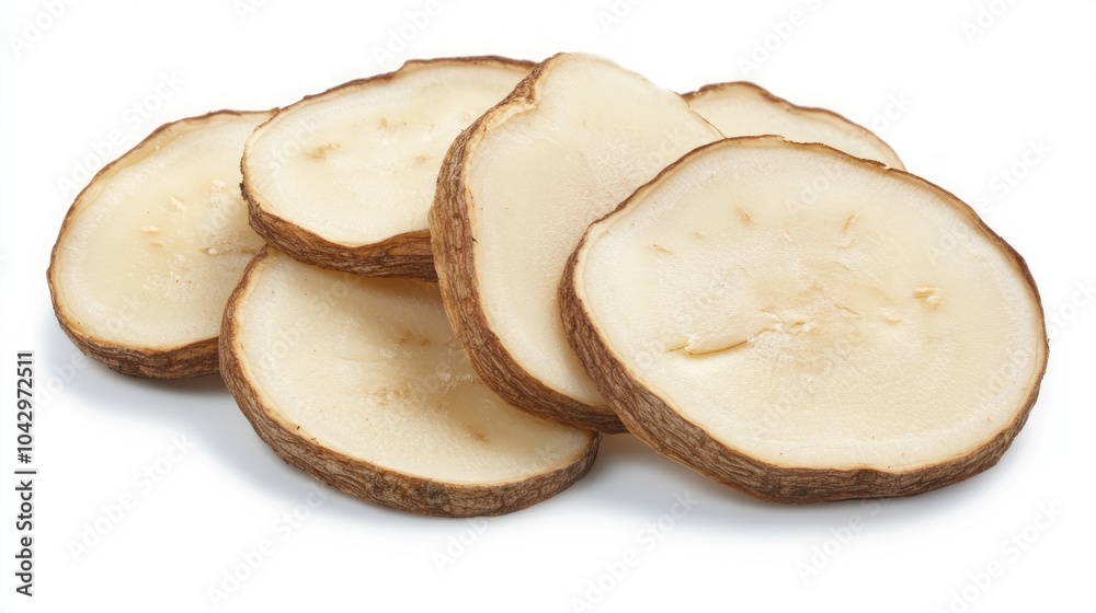 Close-up of potato slices isolated on a white background. Close-up of potato slices isolated on a white background.