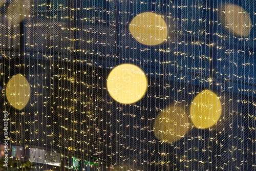 Close-up bokeh lights of Christmas decoration at Swiss Airport Zürich Kloten on a snowy autumn day. Photo taken December 2nd, 2023, Zurich, Switzerland. photo