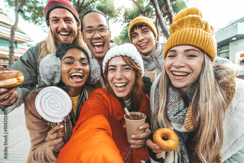 Photography Happy friends wearing winter clothes taking selfie picture with smart mobile pho