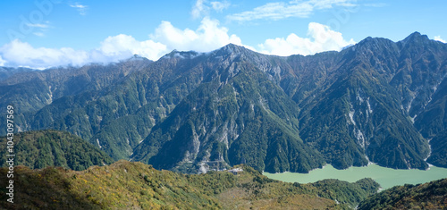 Kurobedaira Station, Tateyama, Toyama, Chubu, Japan, A stunning panoramic view of majestic mountains under a bright blue sky photo