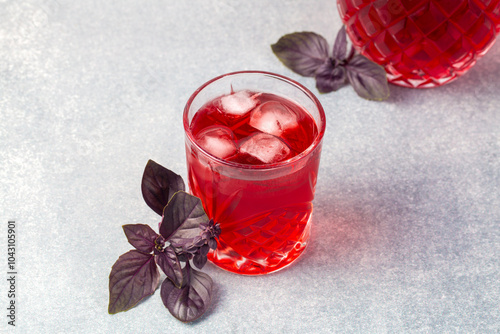 Glass of purple basil sherbet and purple basil photo