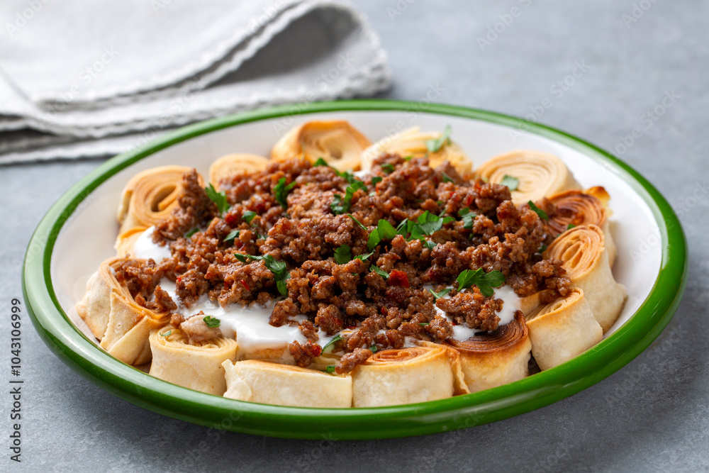 Turkish Manti with Yogurt, Minced Meat and Fried Butter Sauce From Artvin called Silor - Siron - Ziron Rolled Raw Dough and Fried Phyllo -Manlama with Dill