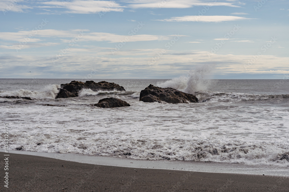 Fascinating Atlantic coast in Iceland with rocks and sea waves from the North Atlantic Fascinating Atlantic coast in Iceland with rocks and sea waves from the North Atlantic
