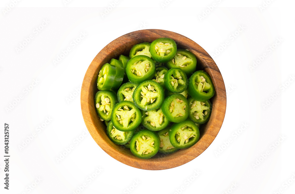 Sliced jalapeno pepper in wooden bowl isolated on white background.