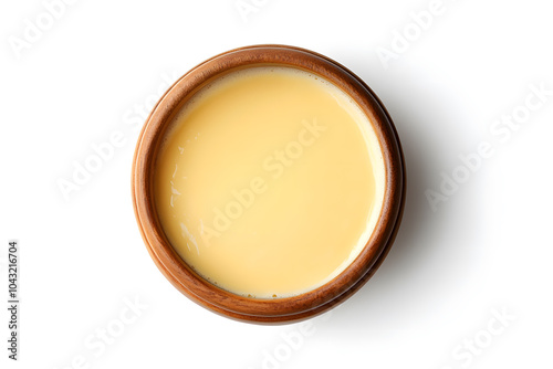 Pot of delicious cheese fondue top view isolated on white background