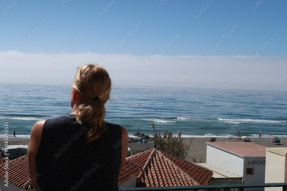 Fototapeta premium Woman enjoying view of mediterranean sea