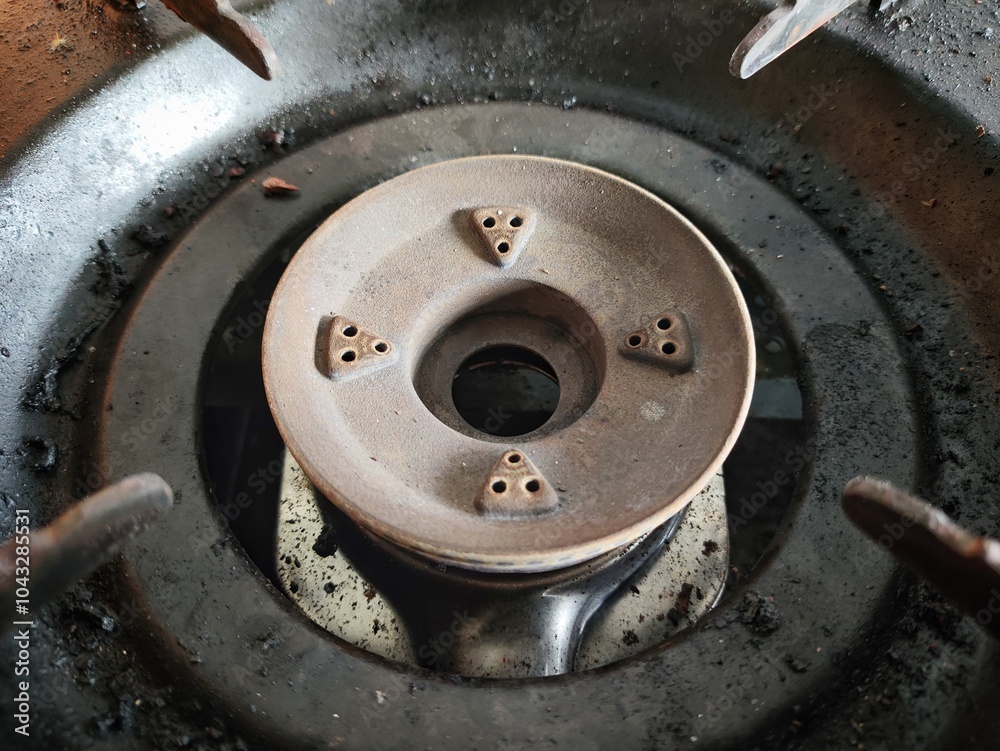 The gas burner is turned off in the kitchen,dirty black gas burner The gas burner is turned off in the kitchen,dirty black gas burner