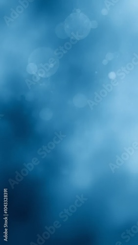 Abstract blue bokeh background with soft light circles, creating a dreamy and calming atmosphere