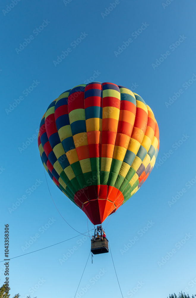 Naklejka premium Colorful Muticolor hot air balloon floting in the blue sky.