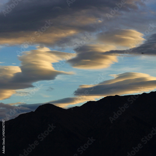 Round clouds at sunrise seen in Hawea, New Zealand. photo