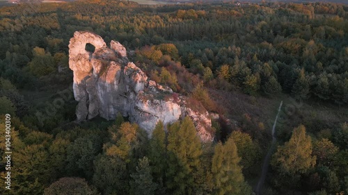 Sunset over Okiennik Wielki limestone boulders Jurassic Highland In Silesia Poland photo