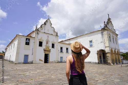 Tourism in Sao Cristovao, Sergipe, Brazil. Young tourist woman visiting Praca do Carmo in the village of Sao Cristovao, Sergipe, Brazil. photo