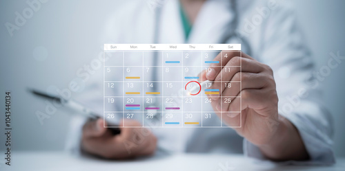 Medical worker touch virtual digital calendar on tablet for plan treatment patient and follow up in hospital. Calendar agenda appointment meeting schedule concept.Planning Organizer, Time management photo