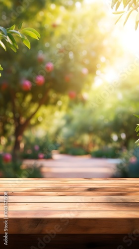 Wooden table for product placement with sunny sunset garden in background. photo