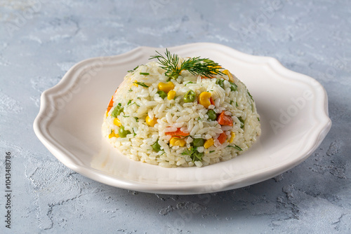 Delicious vegetable rice pilaf with green peas, carrots and sweet corn (Turkish name; sebzeli pilav) photo